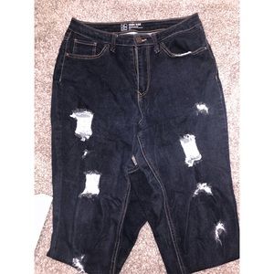 Ripped high rise skinny jeans